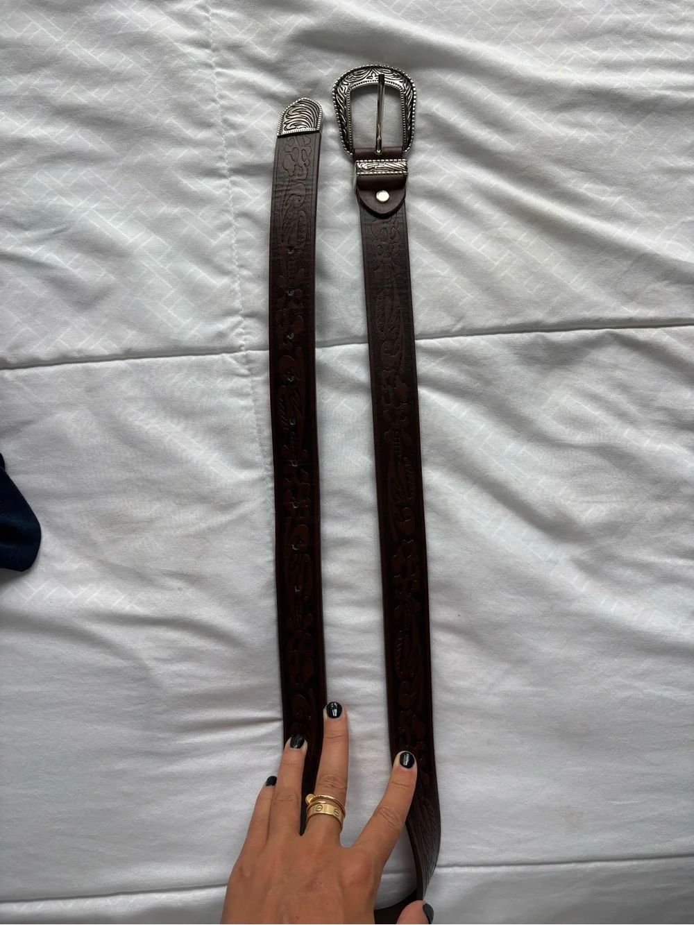 Tooled Brown Leather Belt with Ornate Silver Buckle